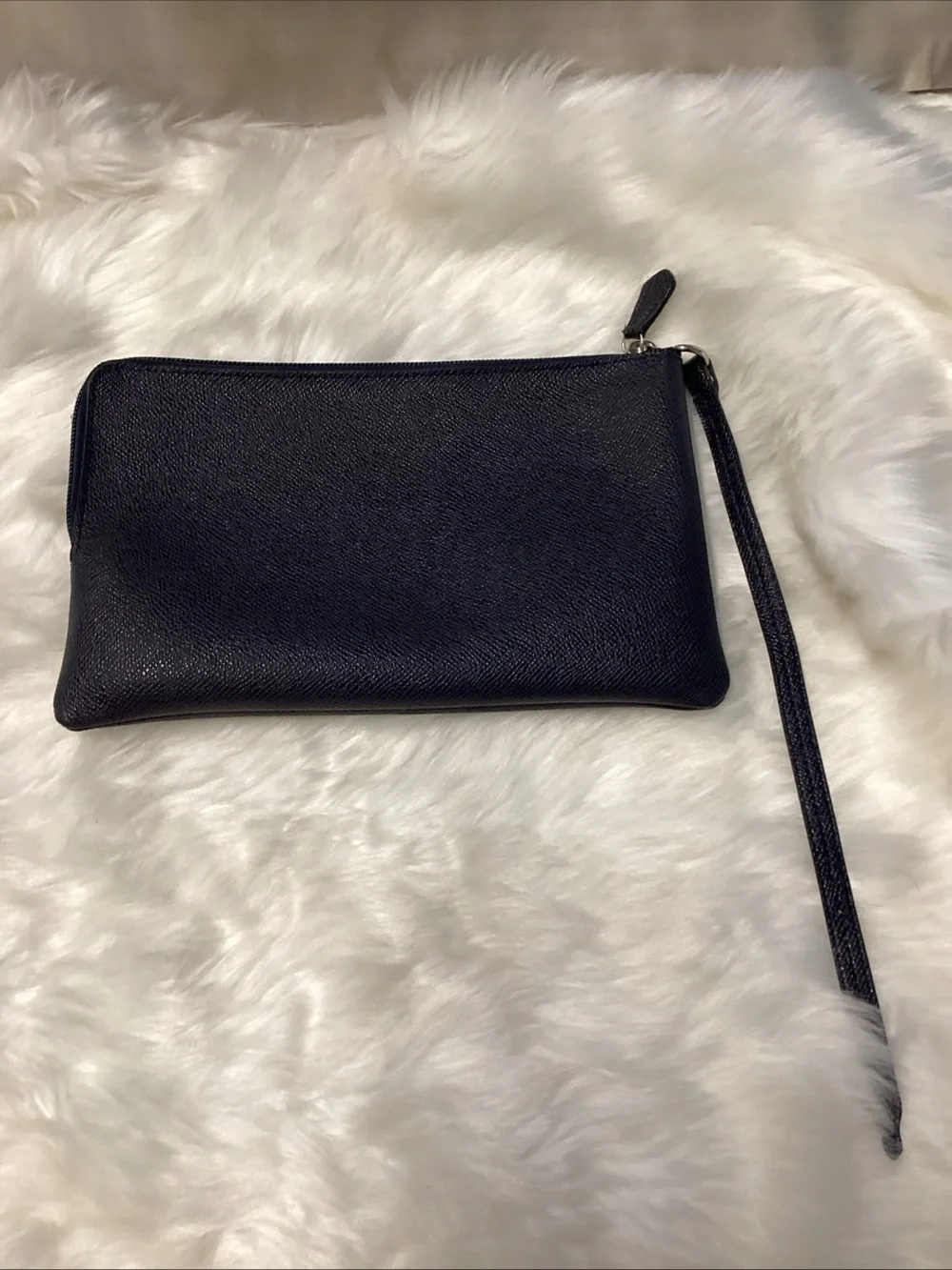 Coach Navy Wristlet with Cream Logo Text